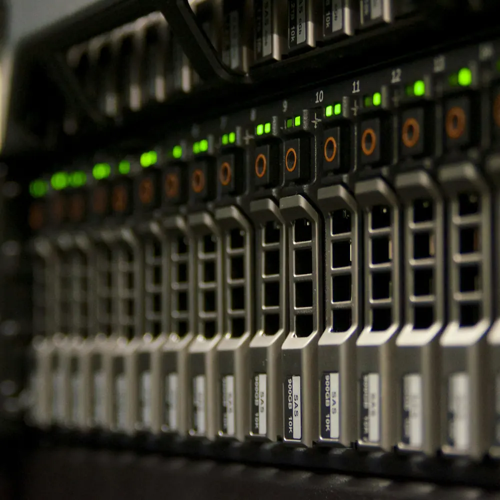 Photo: Hugovanmeijeren, CC BY-SA 3.0, via Wikimedia Commons Rows of servers in a data center